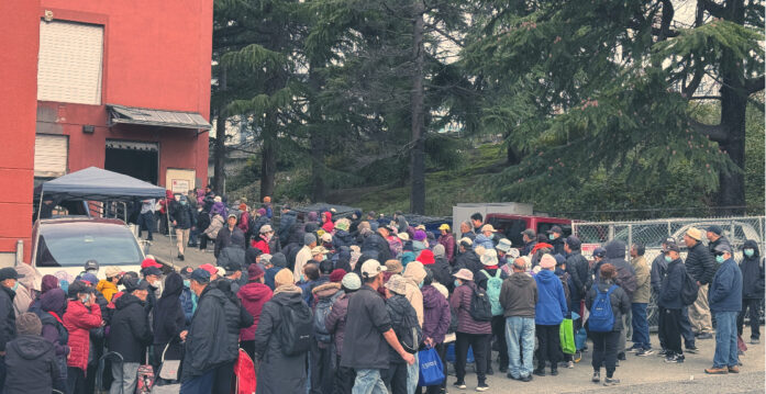 Long lines outside the ACRS Food Bank_Featured